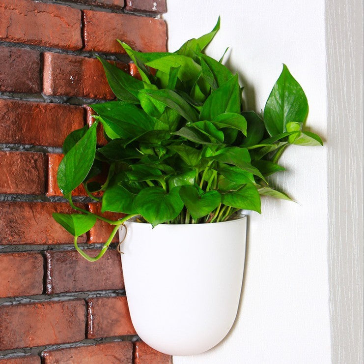 Hanging Flower Pots At Right-angle Corners On The Wall