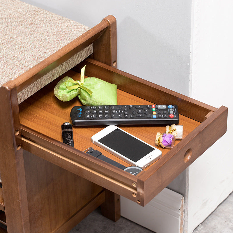 Peut s'asseoir sur le tabouret de rangement et de changement de chaussures